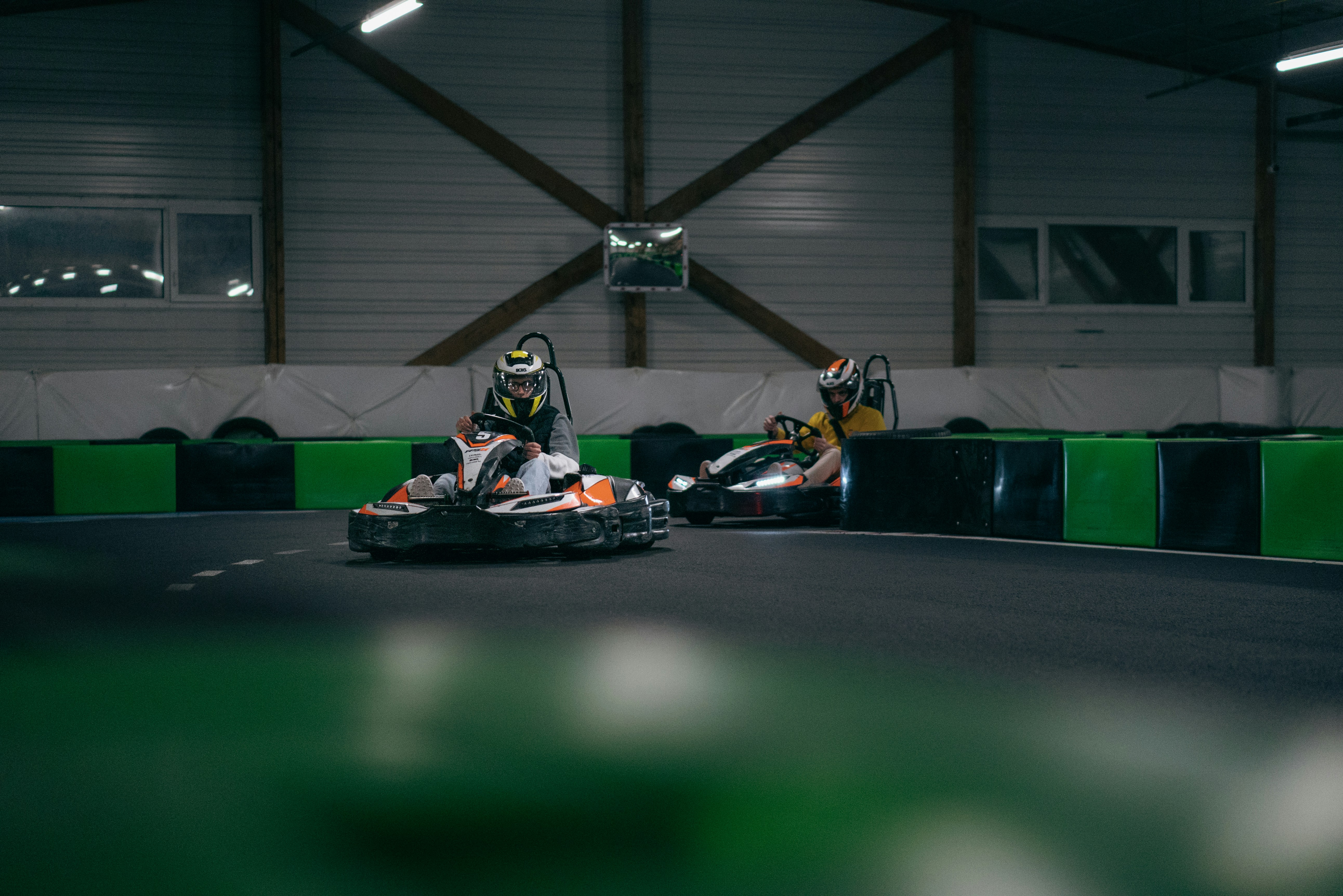 A couple of people that are in a kart
