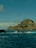 A small island in the middle of the ocean