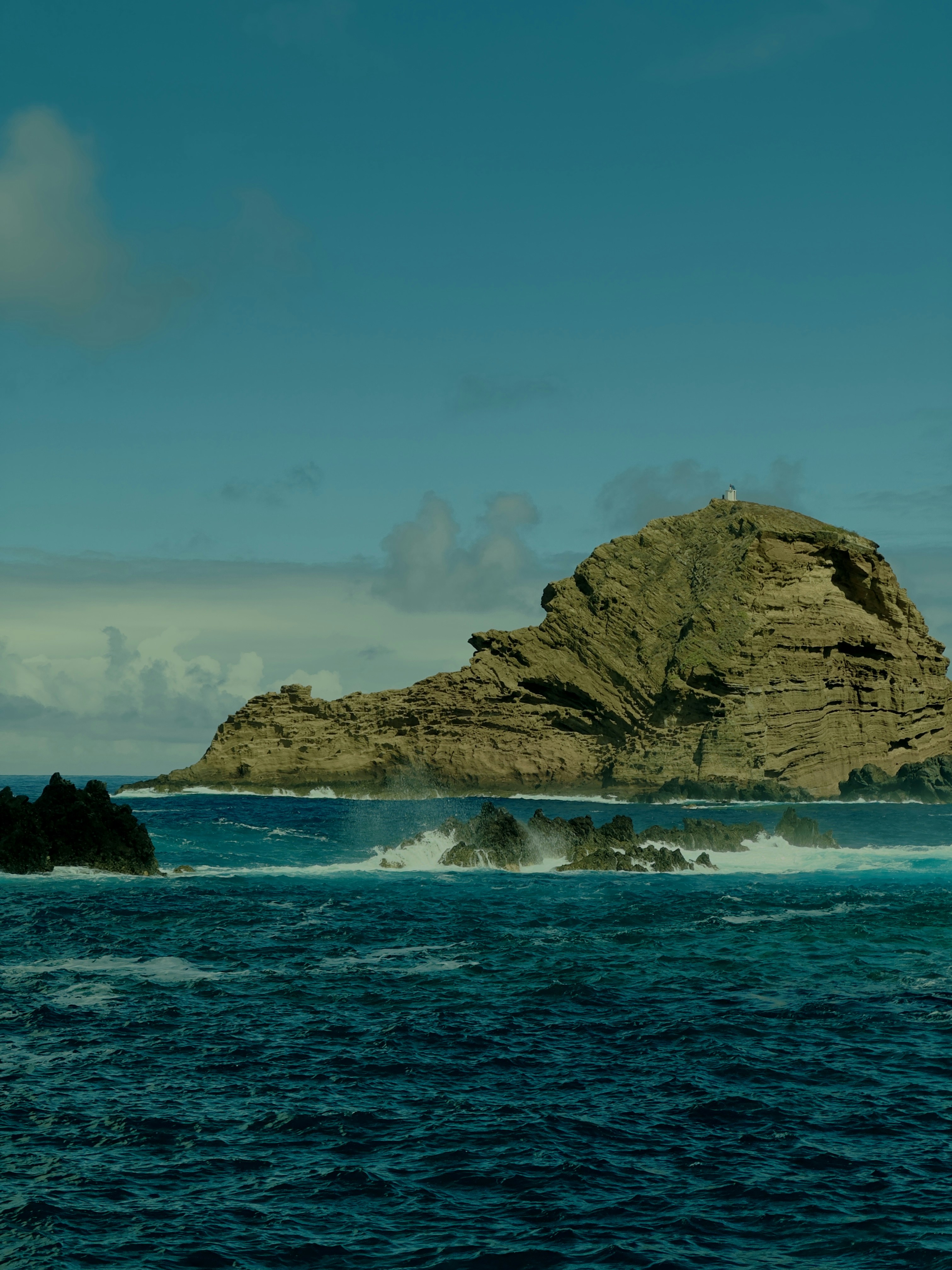 A small island in the middle of the ocean