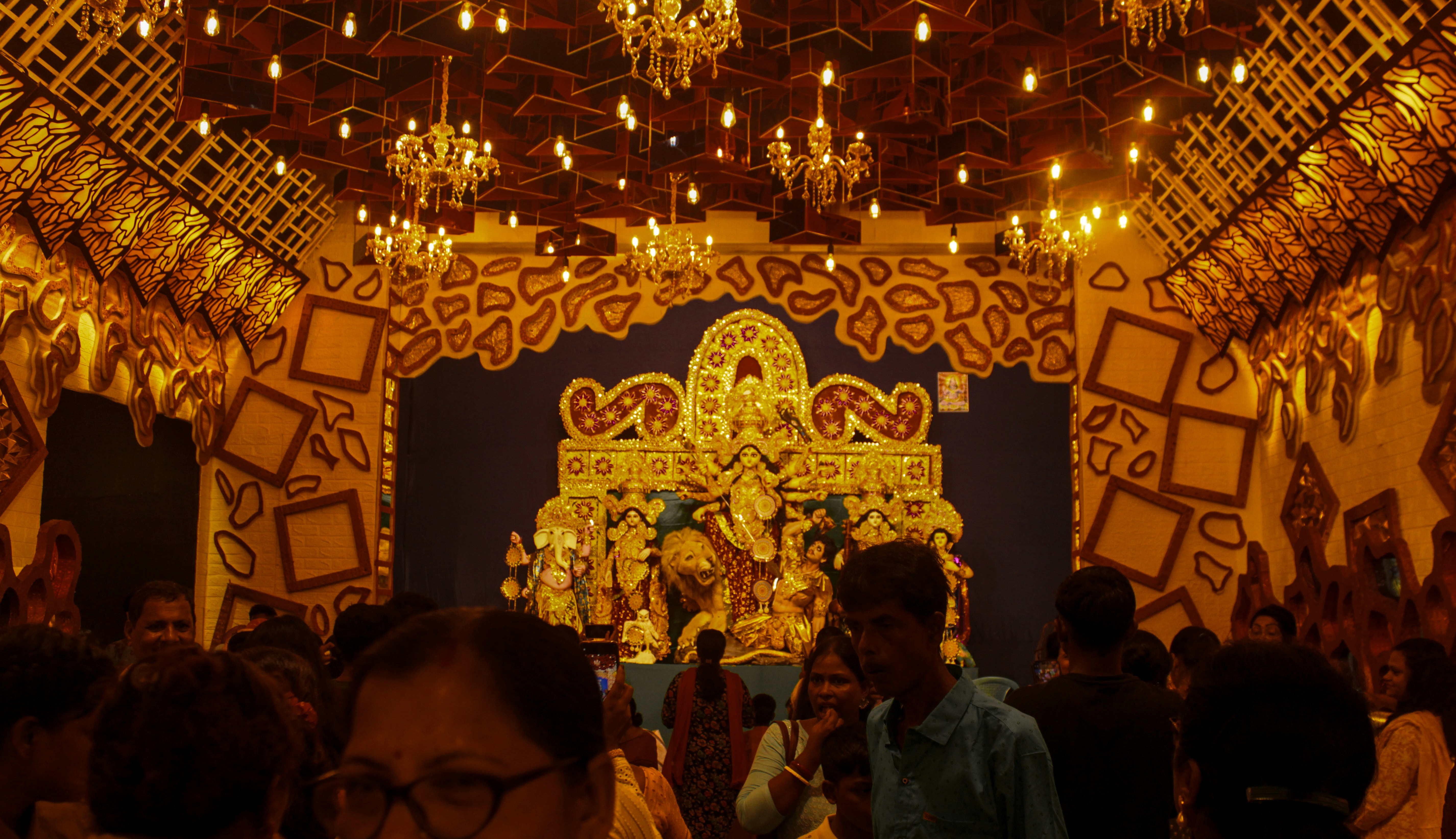 A group of people standing in a room