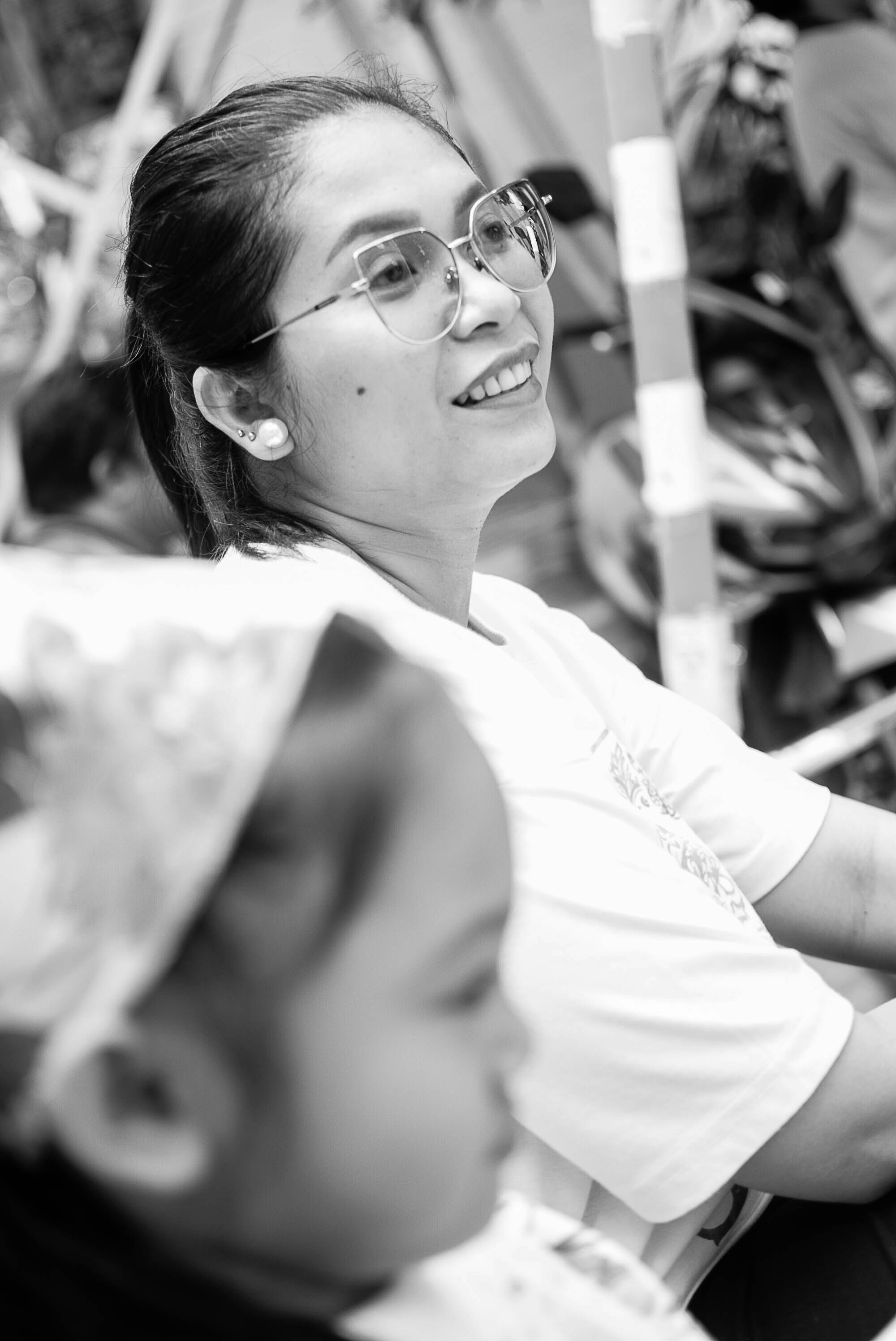 A black and white photo of a woman and a child