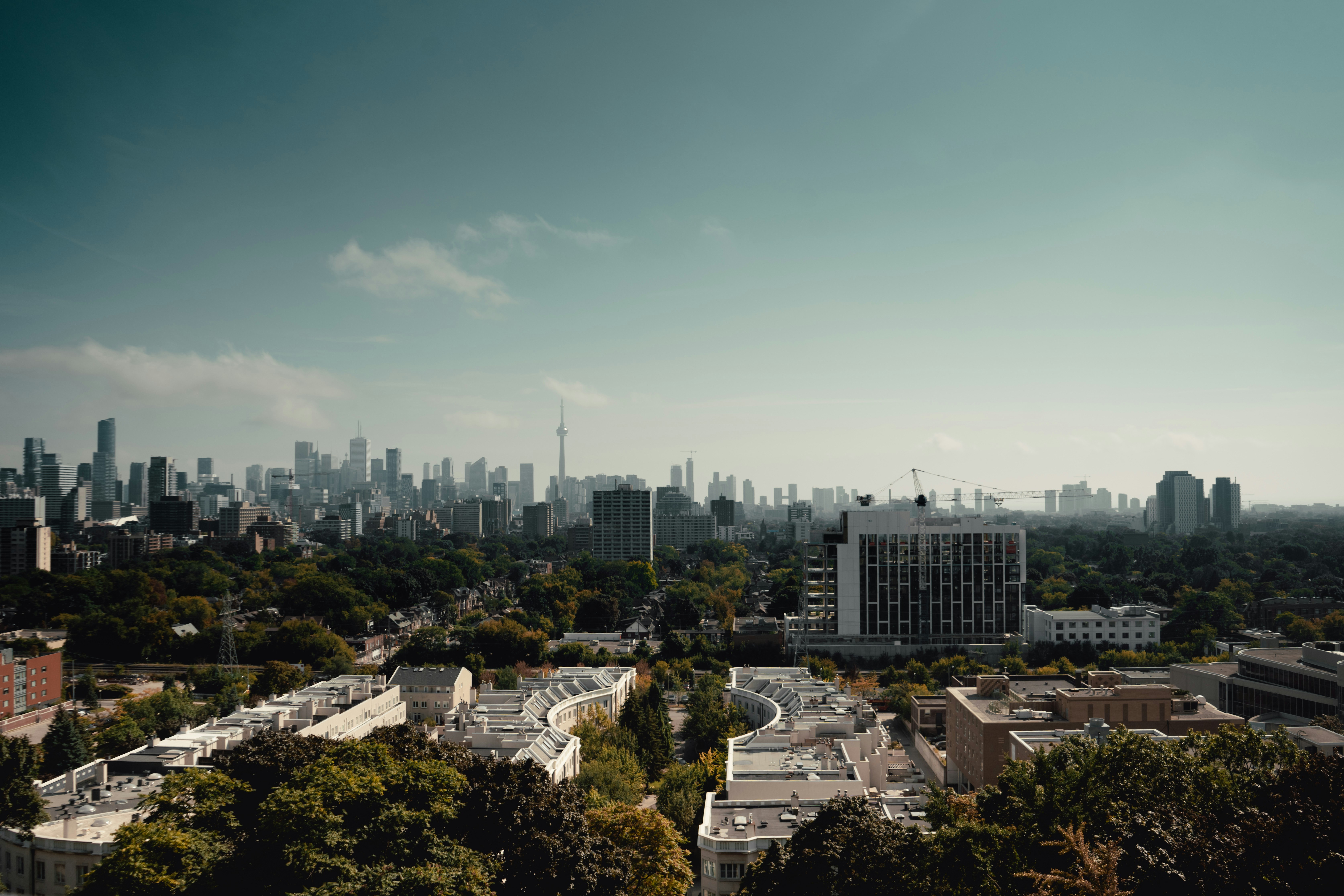 An aerial view of a city with tall buildings