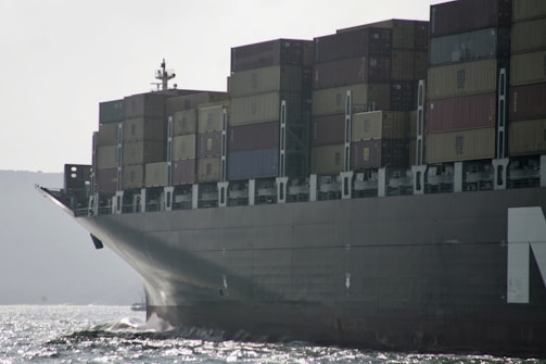 A large cargo ship in the middle of the ocean
