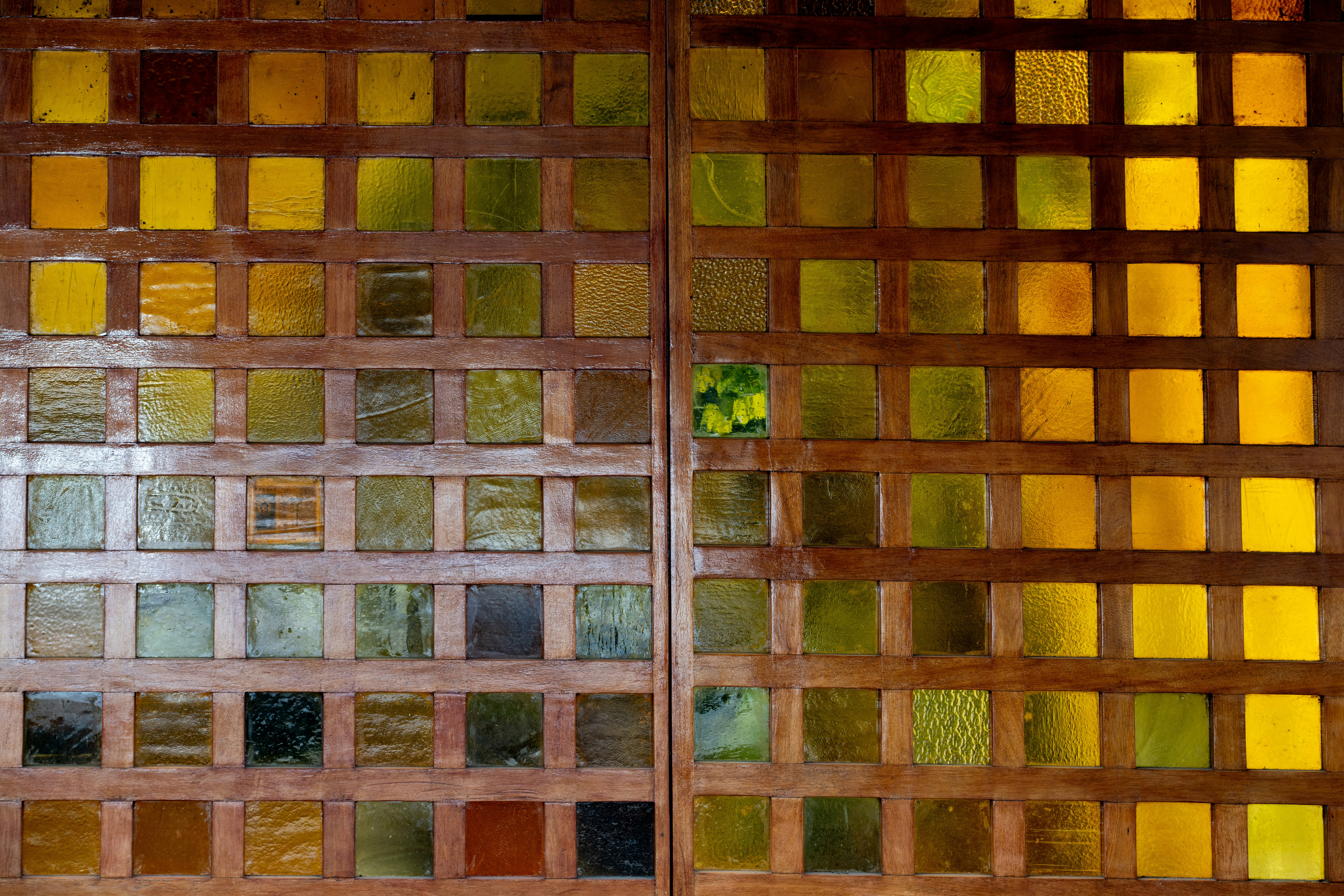 A close up of a wall made of glass blocks