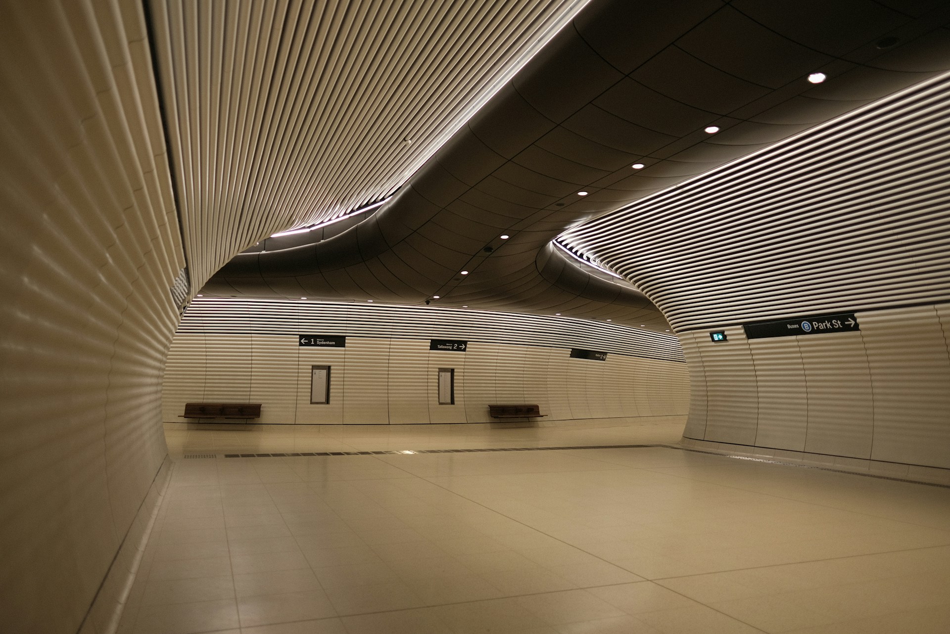 An empty room with white walls and a ceiling