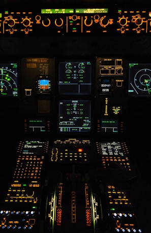 A view of the cockpit of an airplane at night