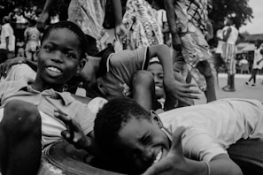 A black and white photo of a boy and a girl