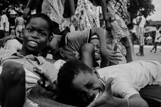 A black and white photo of a boy and a girl