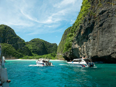 A couple of boats that are in the water