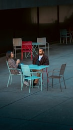 A couple of people sitting at a table