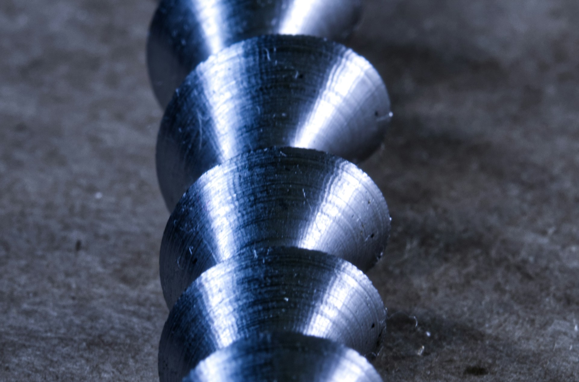 A close up of a metal object on the ground