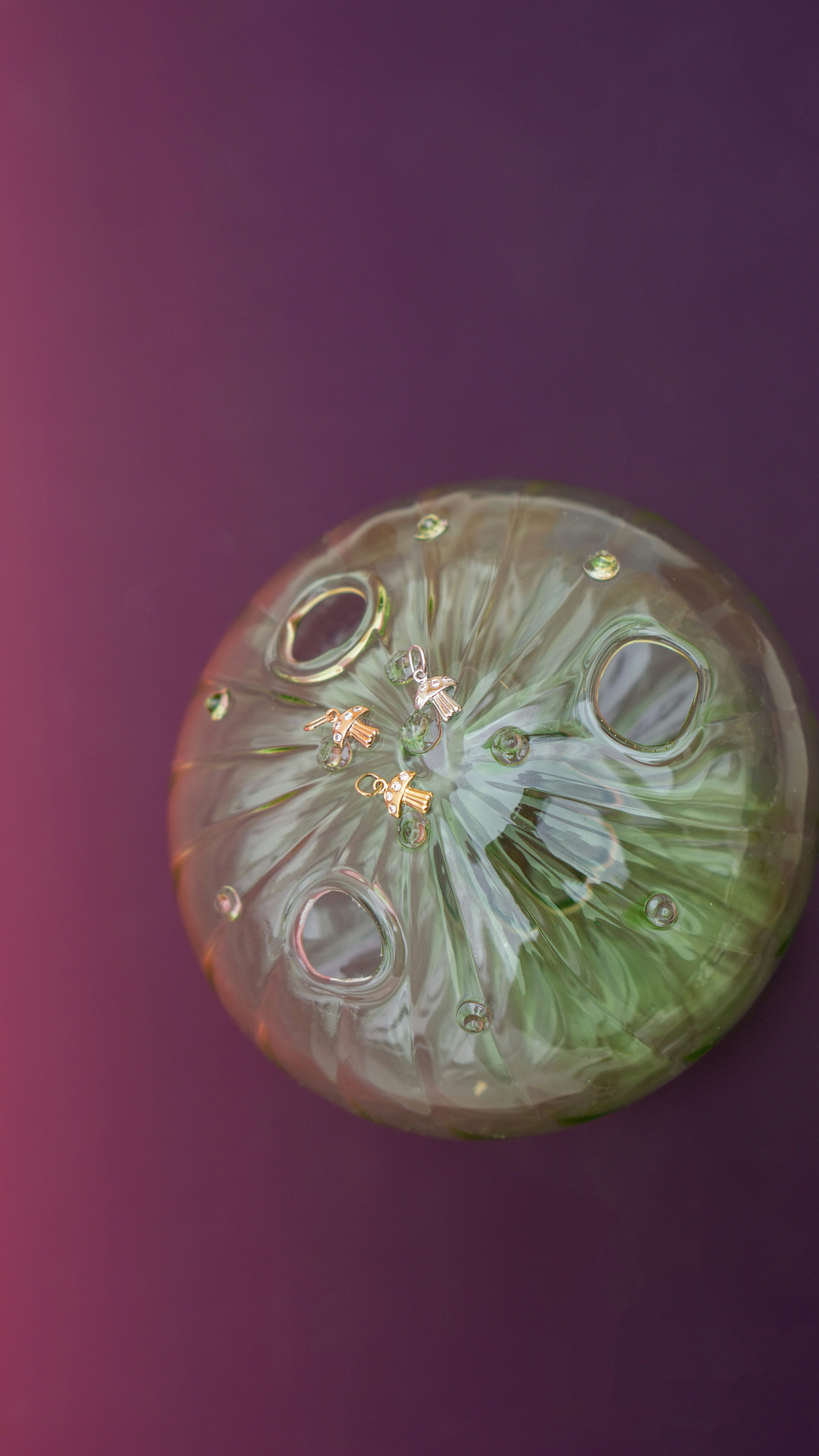 A green object floating on top of a purple surface