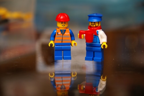 A couple of legos standing next to each other