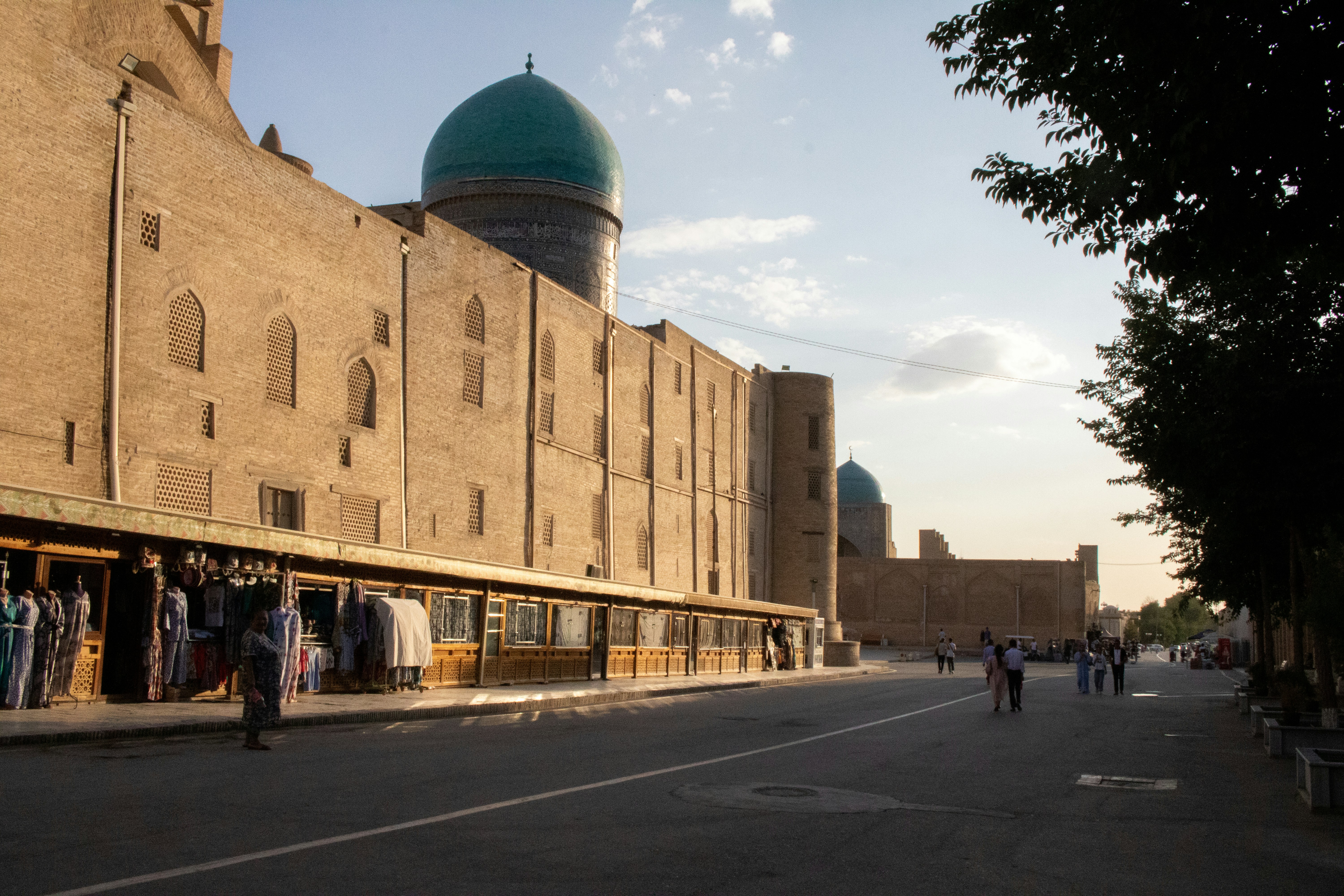 A large building with a green dome on top of it
