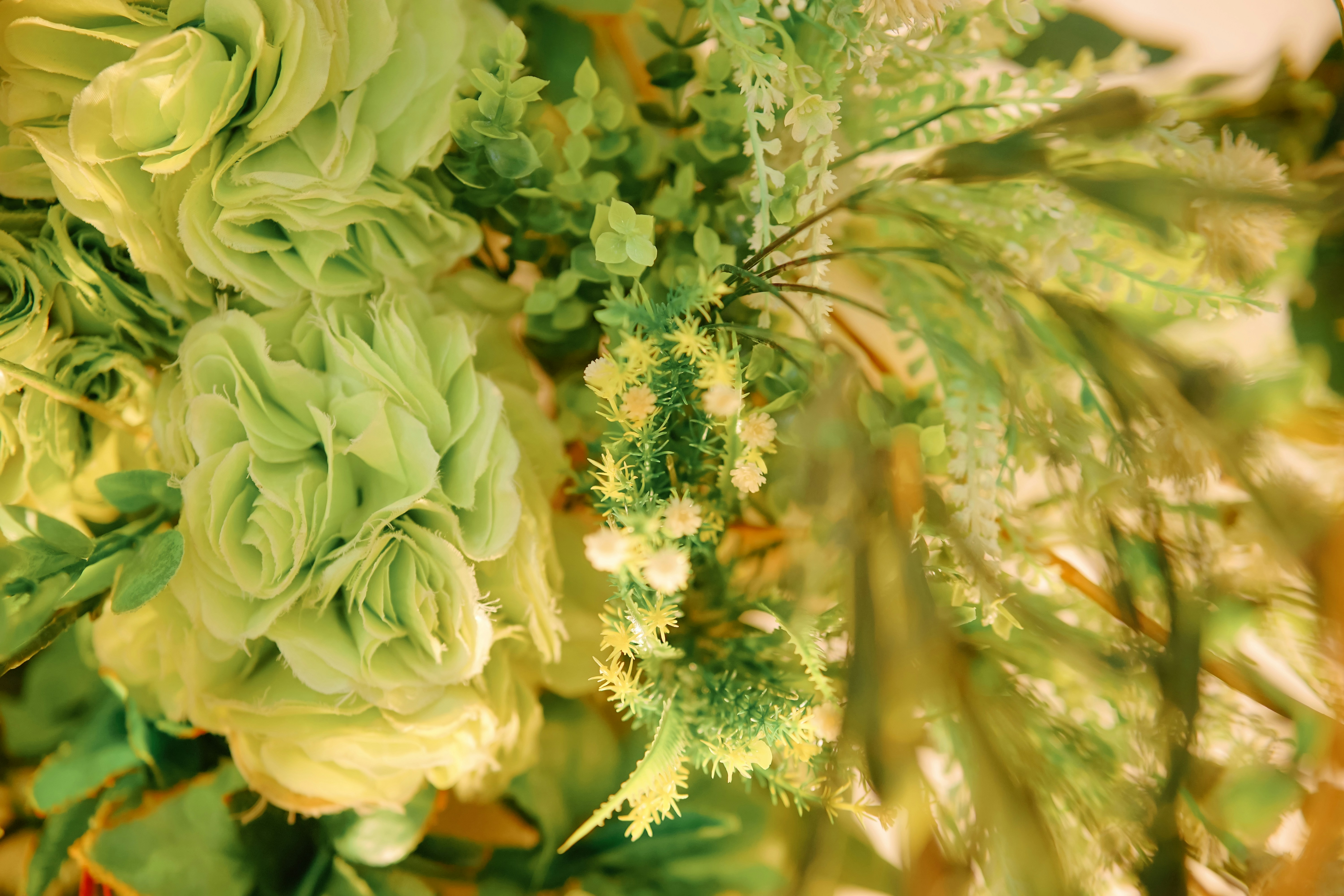 A bouquet of flowers sitting on top of a table