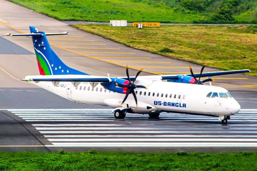 An airplane is on the runway at the airport, US-Bangla Airlines ATR 72-600