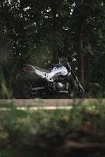 A motorcycle parked on the side of the road