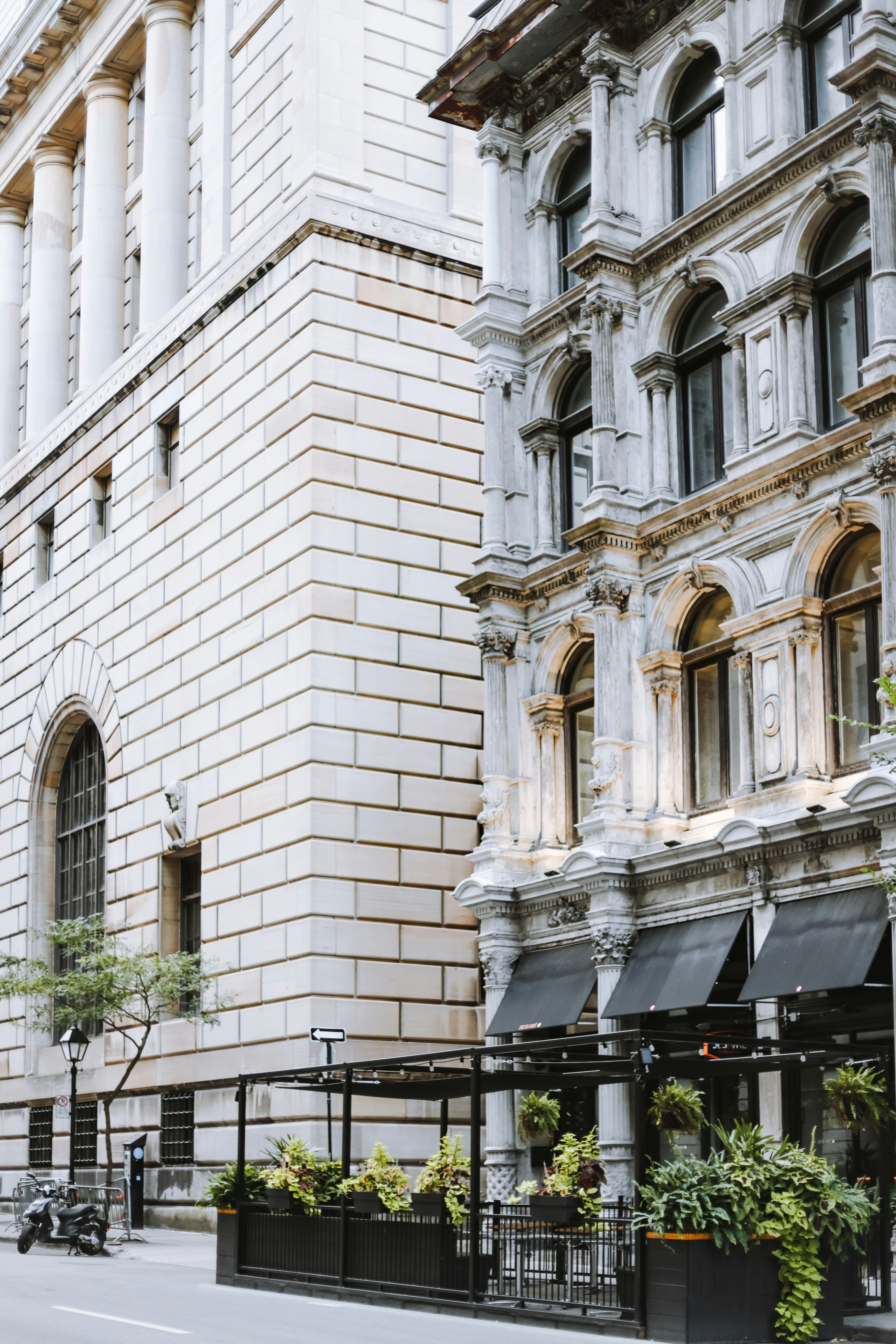 A tall building with lots of windows on the side of it