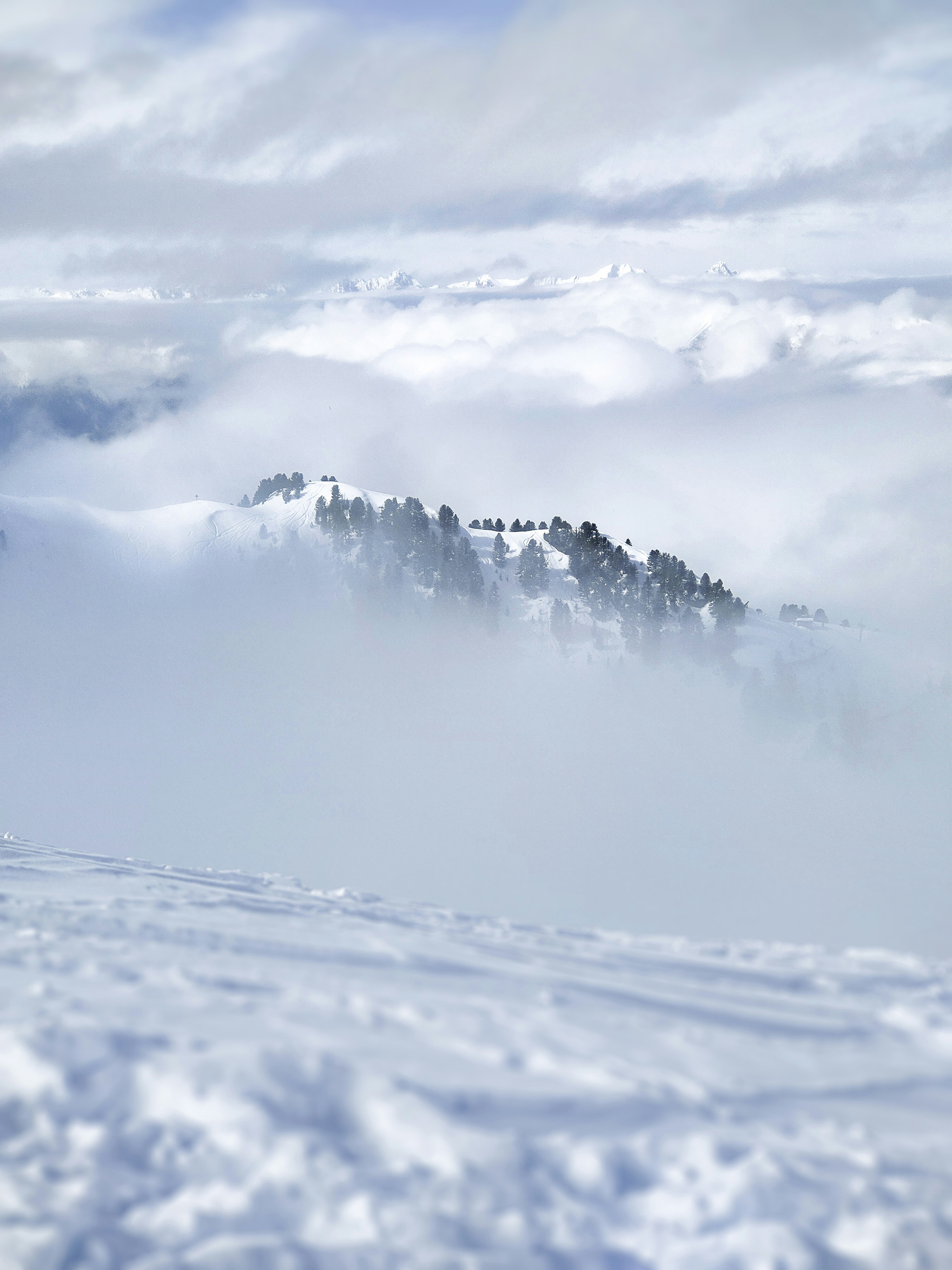 A person on a snowboard in the snow