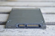 A close up of a device on a wooden surface