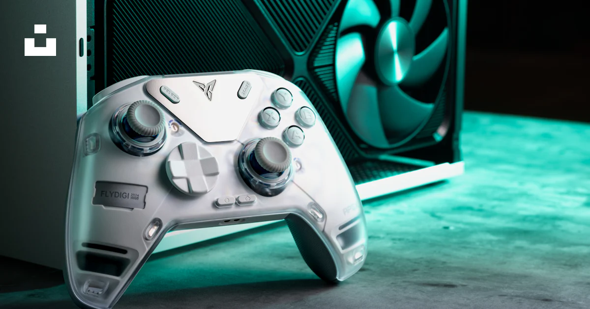 A close up of a video game controller photo – Free Controller Image on ...