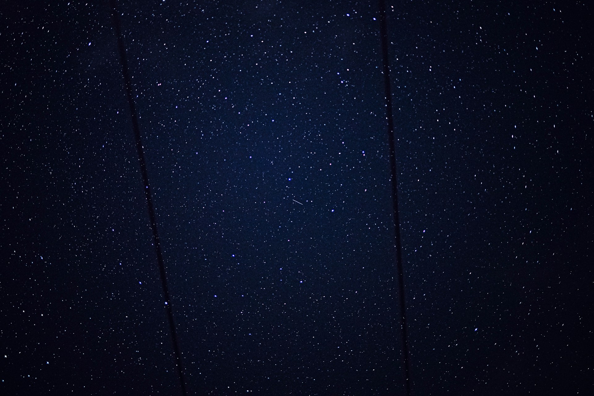 A dark blue background with snow flakes