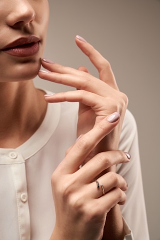 A woman with a ring on her finger