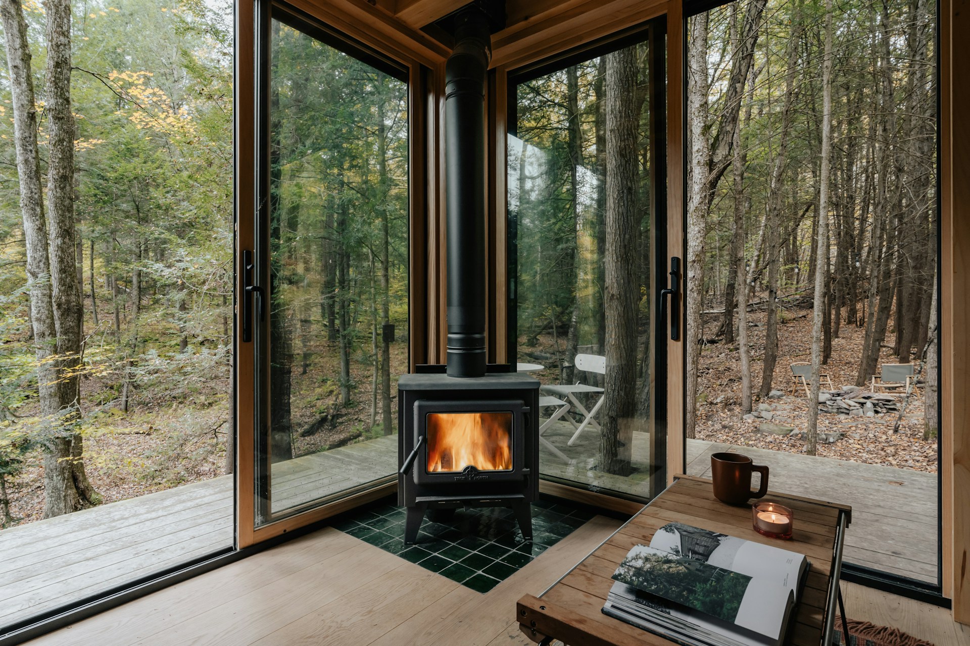 A living room with a wood burning stove in it