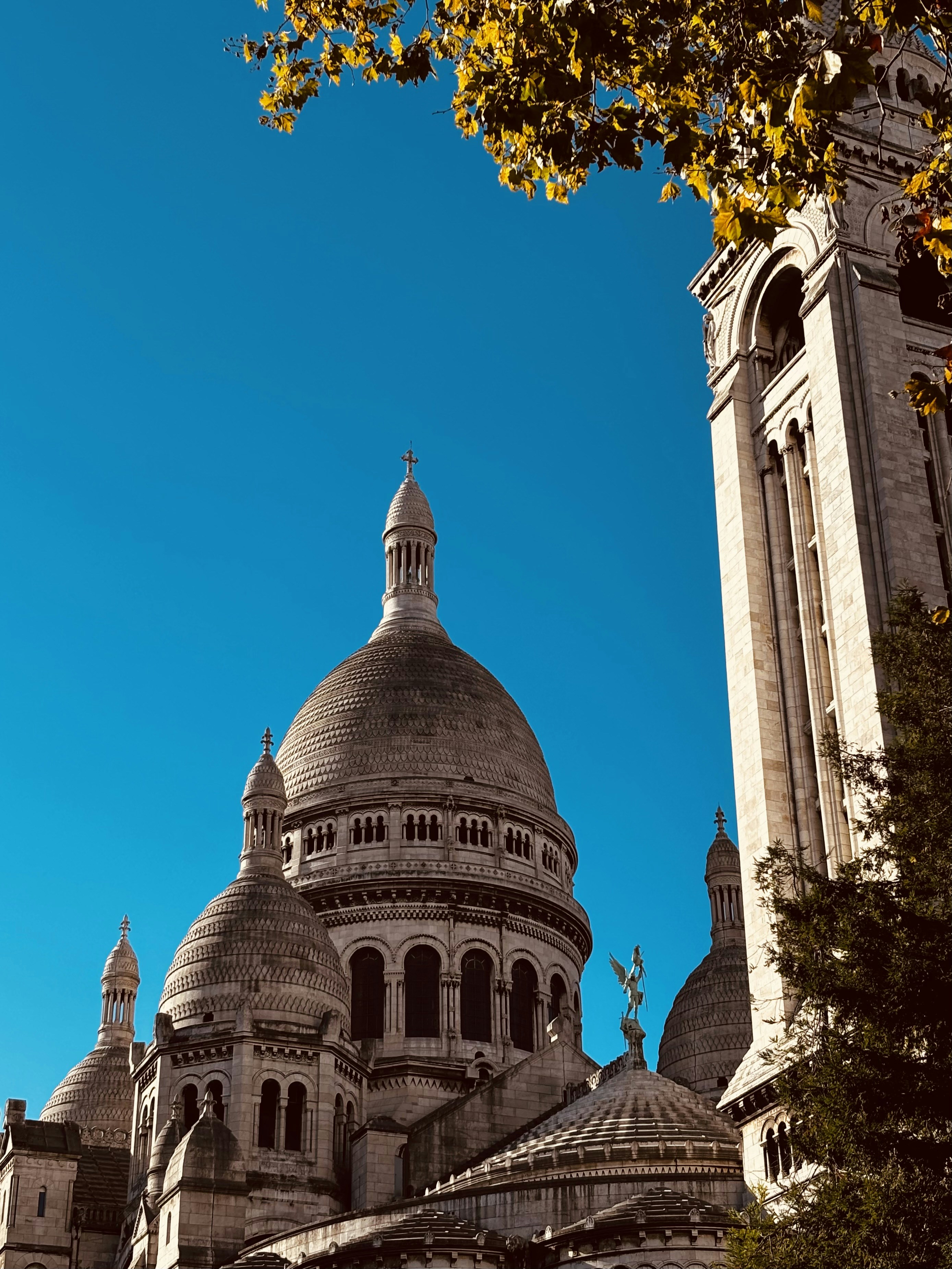 A tall building with a clock on the top of it