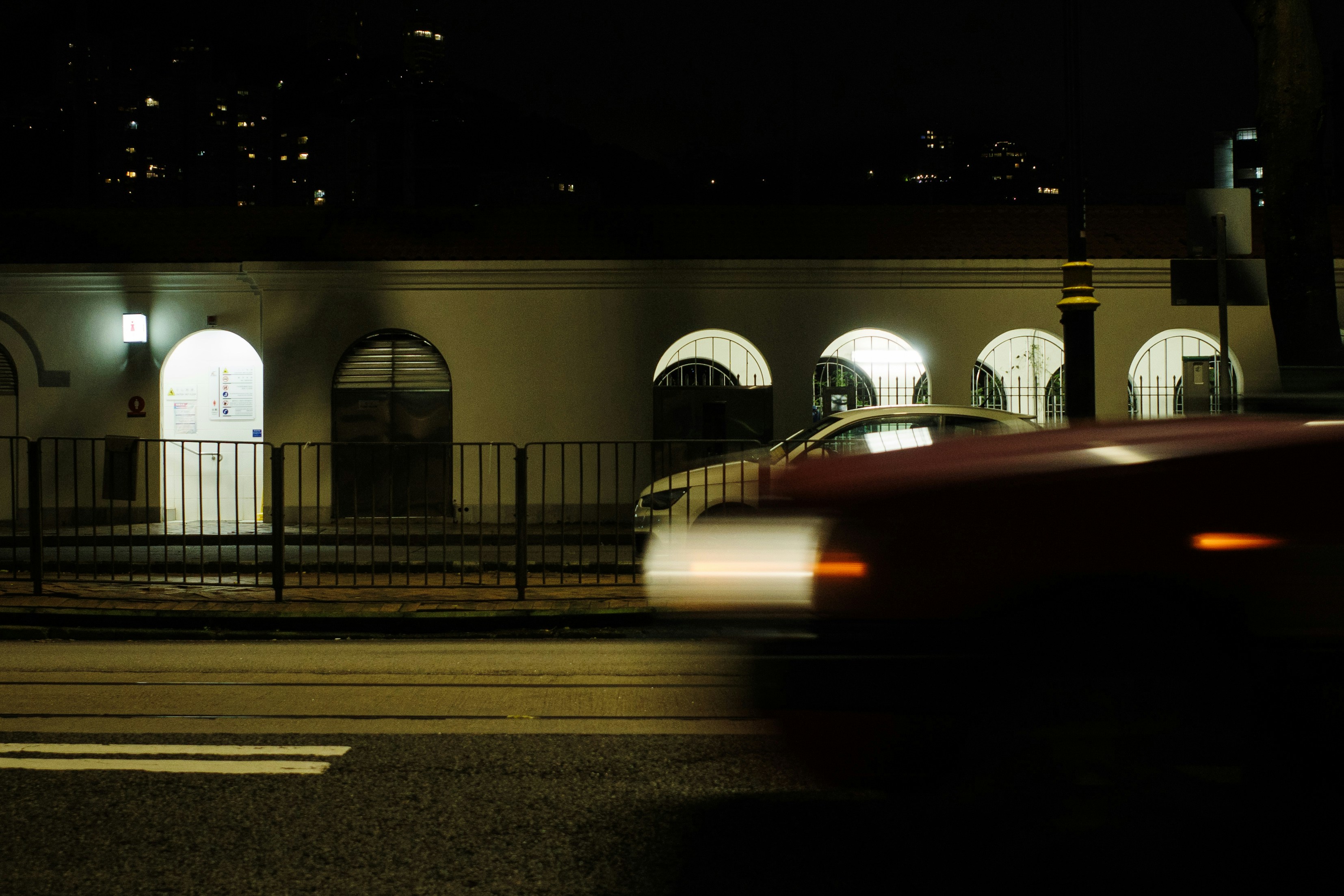 A blurry photo of a city street at night