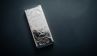 A piece of metal with a design on it