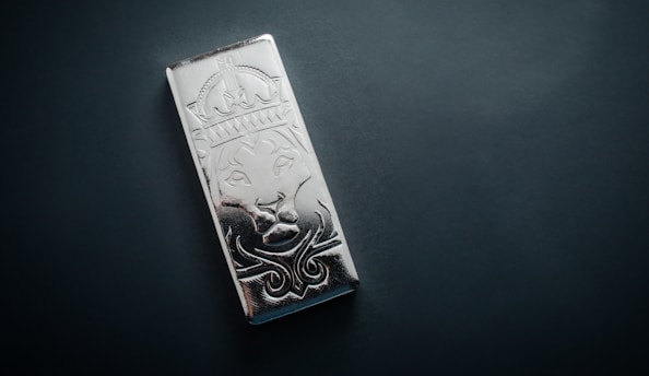 A piece of metal with a design on it
