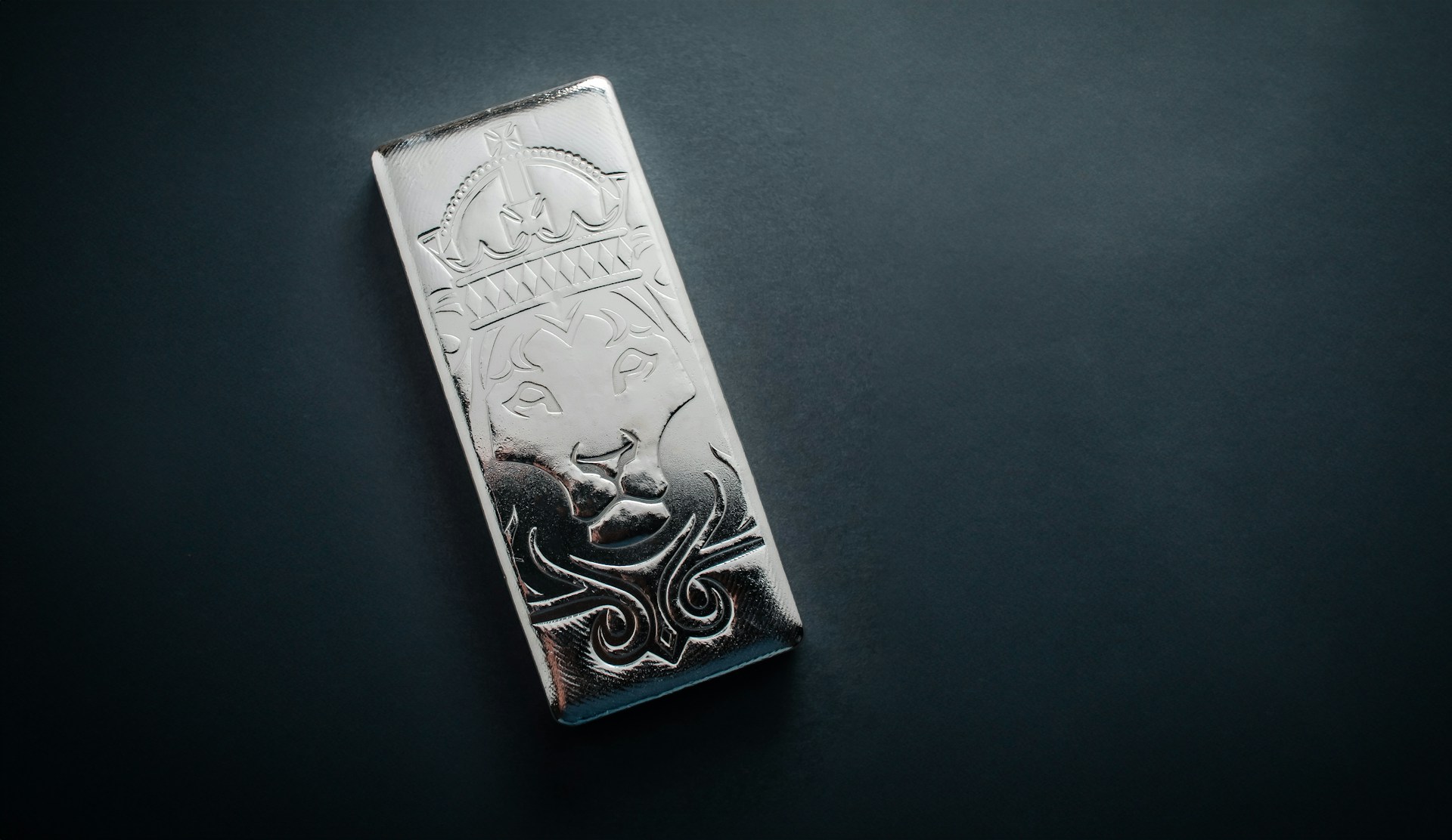 A piece of metal with a design on it