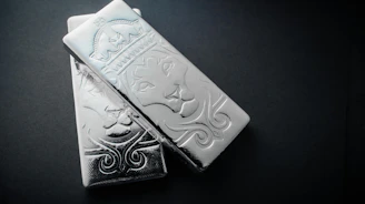 A couple of white chocolate bars sitting on top of a table