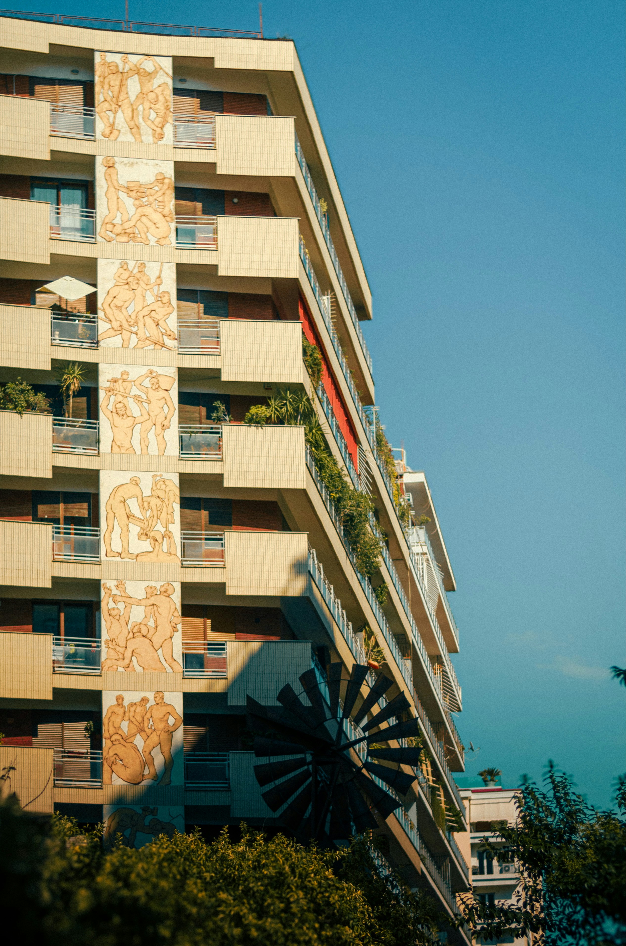 A tall building with a clock on the side of it