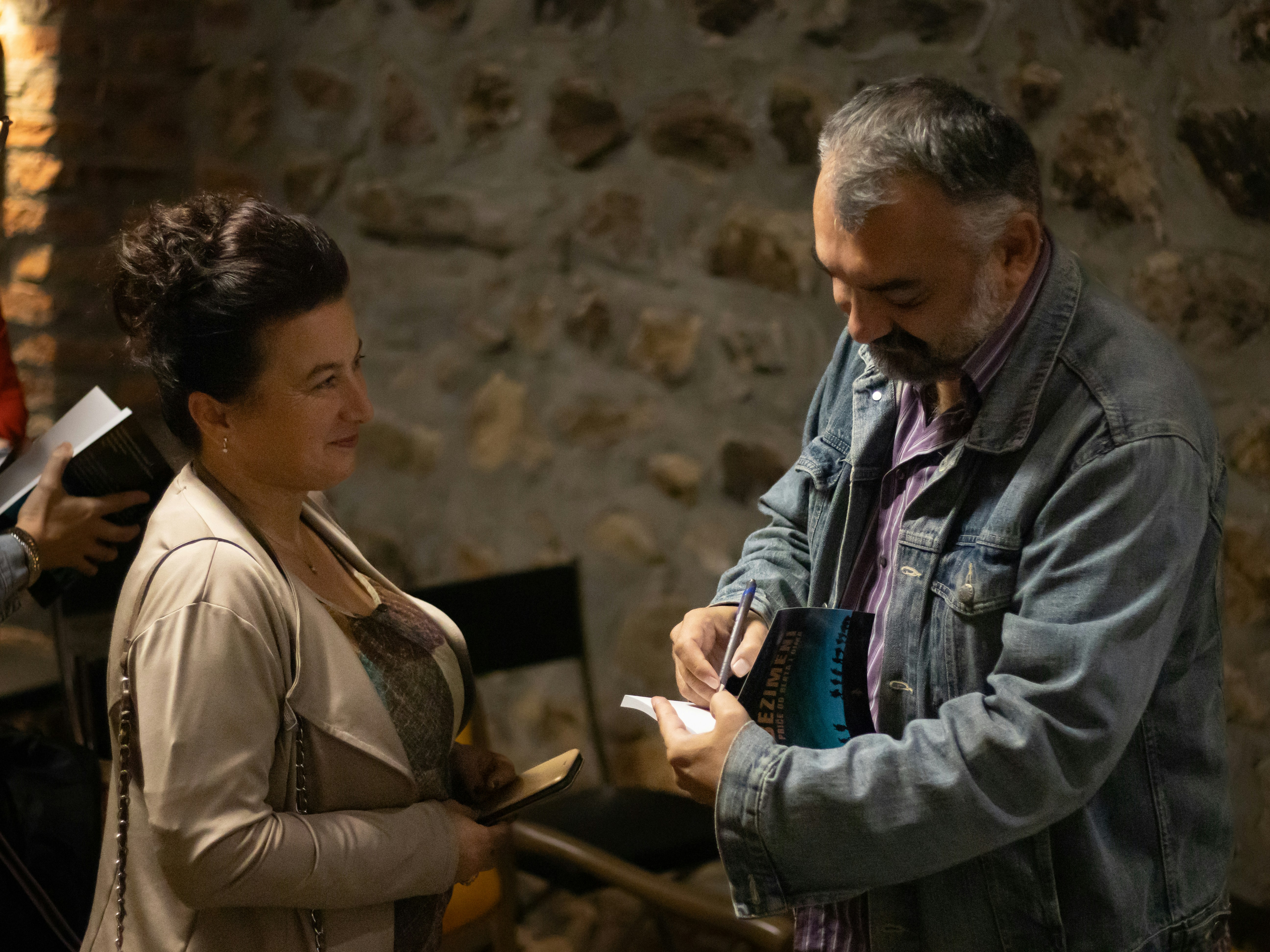 A man and a woman standing next to each other