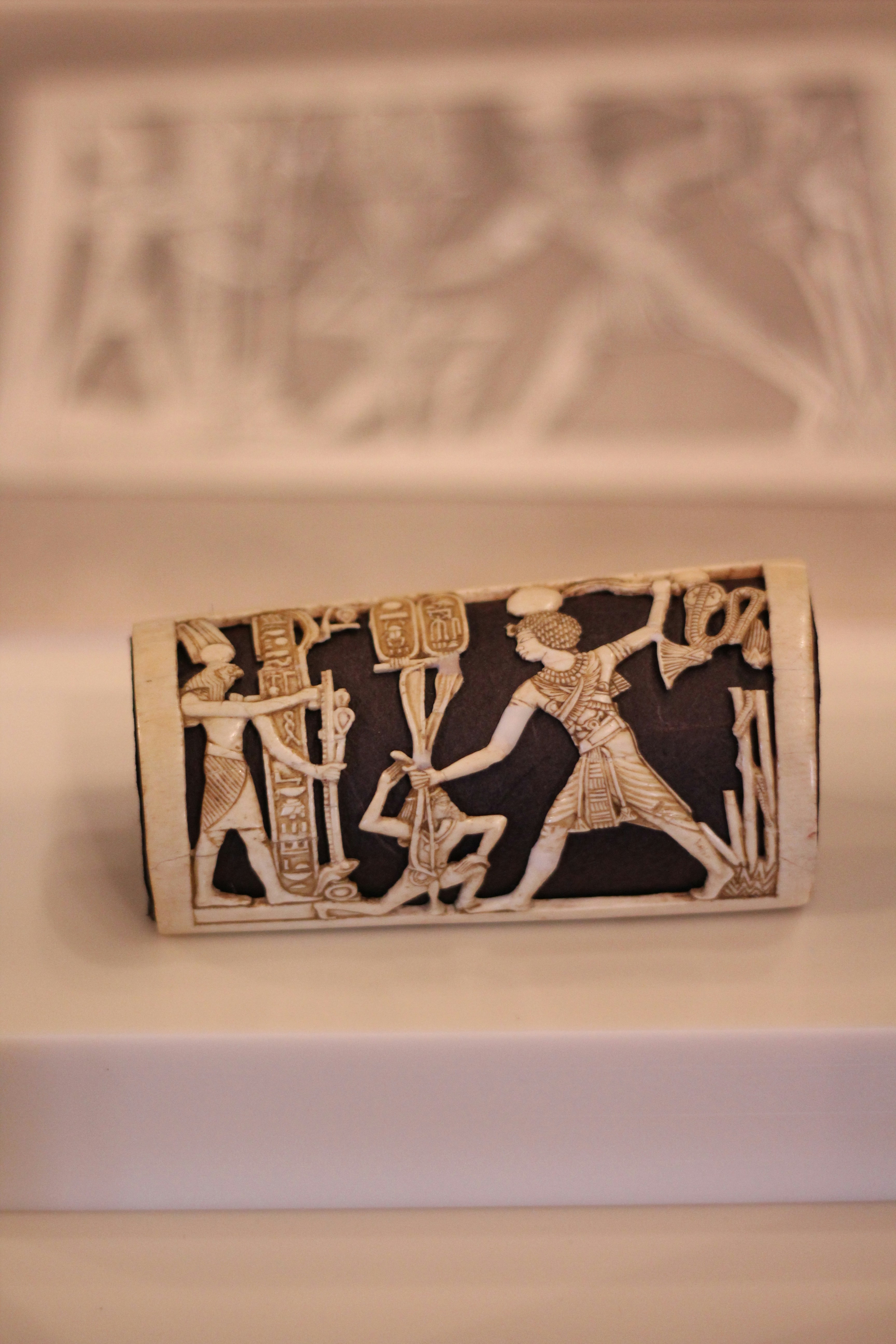 A small black and white object on a table