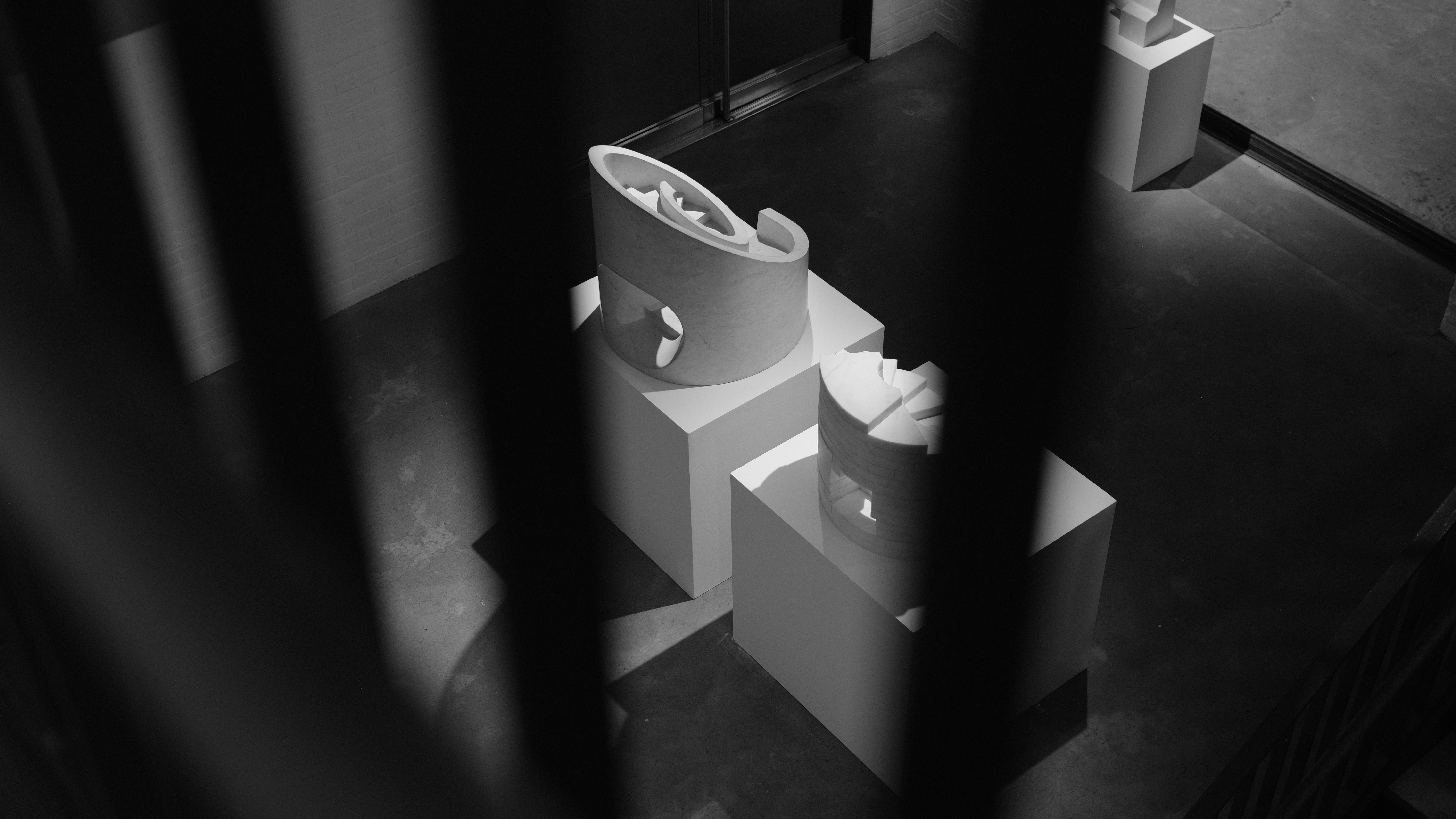 A black and white photo of a toilet in a bathroom