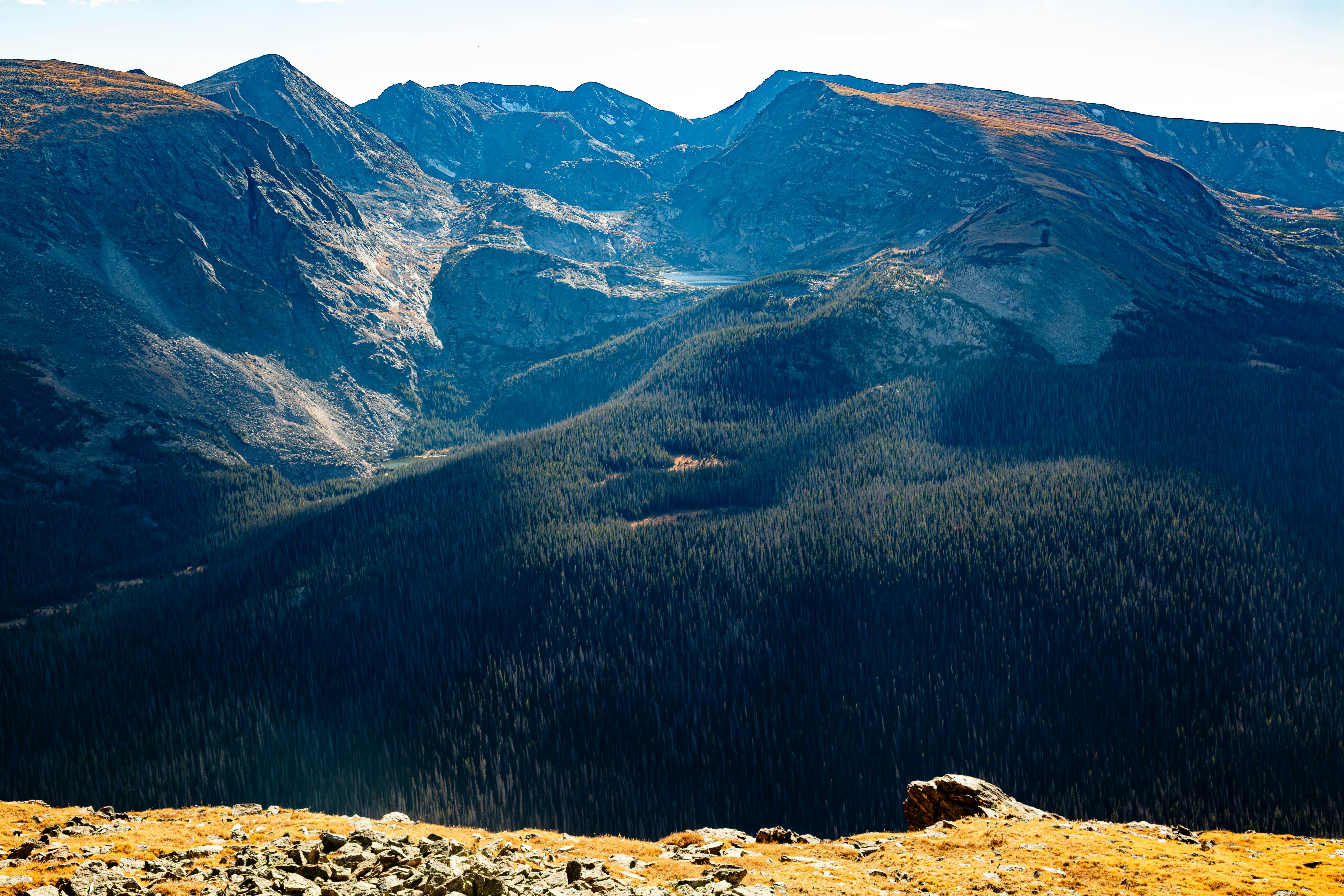 A view of mountains from the top of a mountain