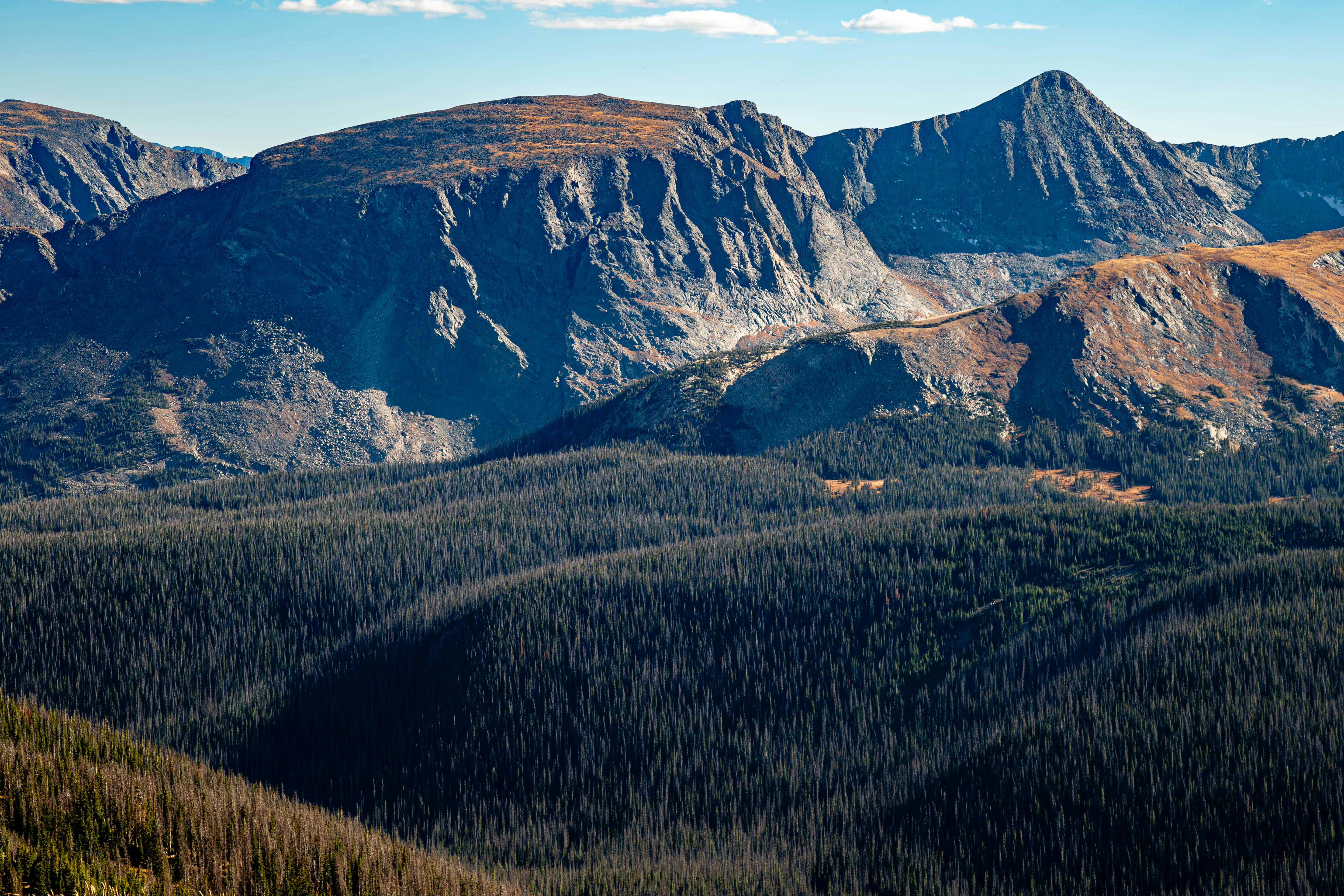 A view of a mountain range from a distance
