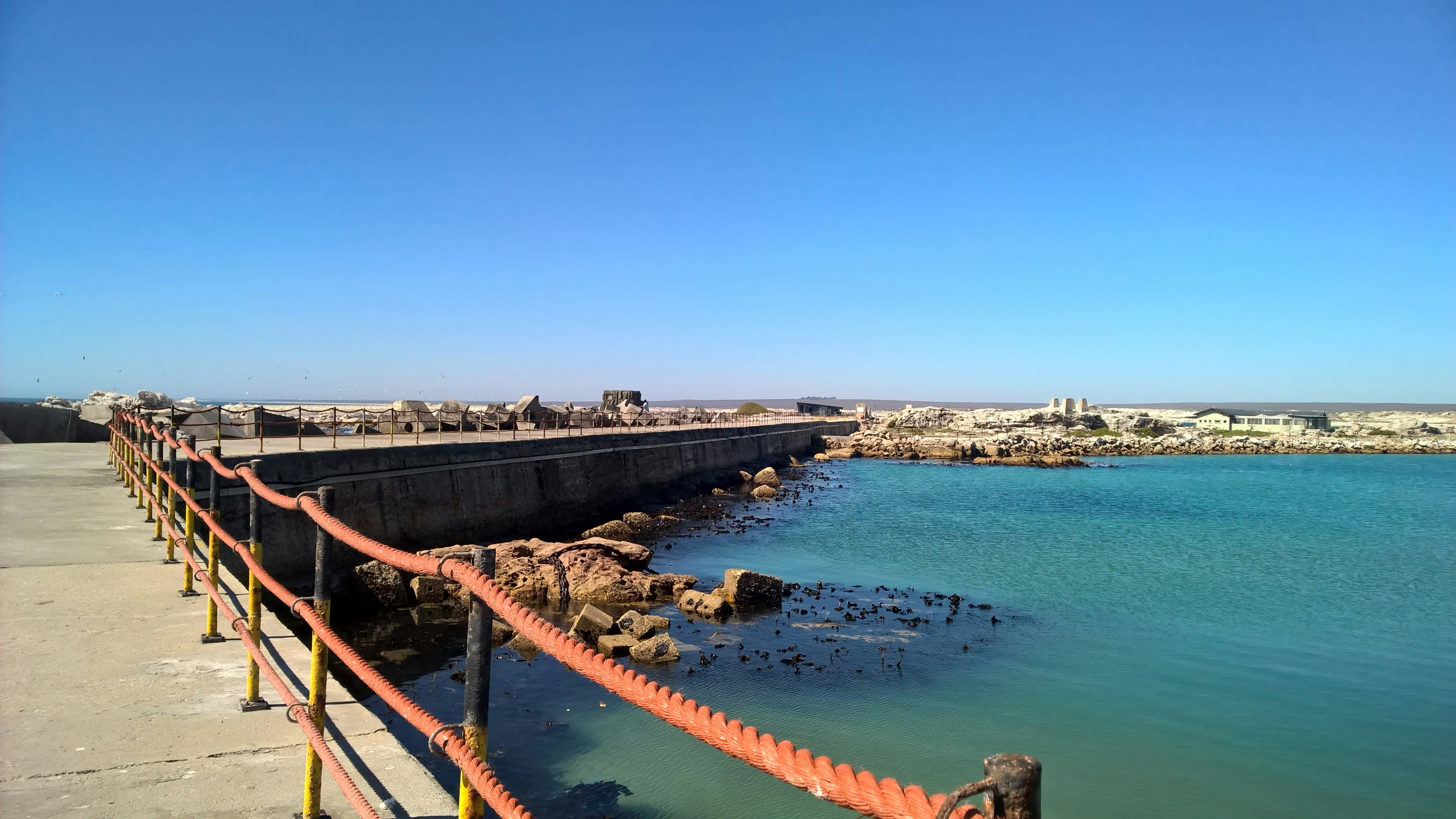 A view of the ocean from a pier