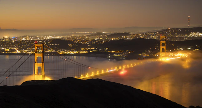 A view of the golden gate bridge at night