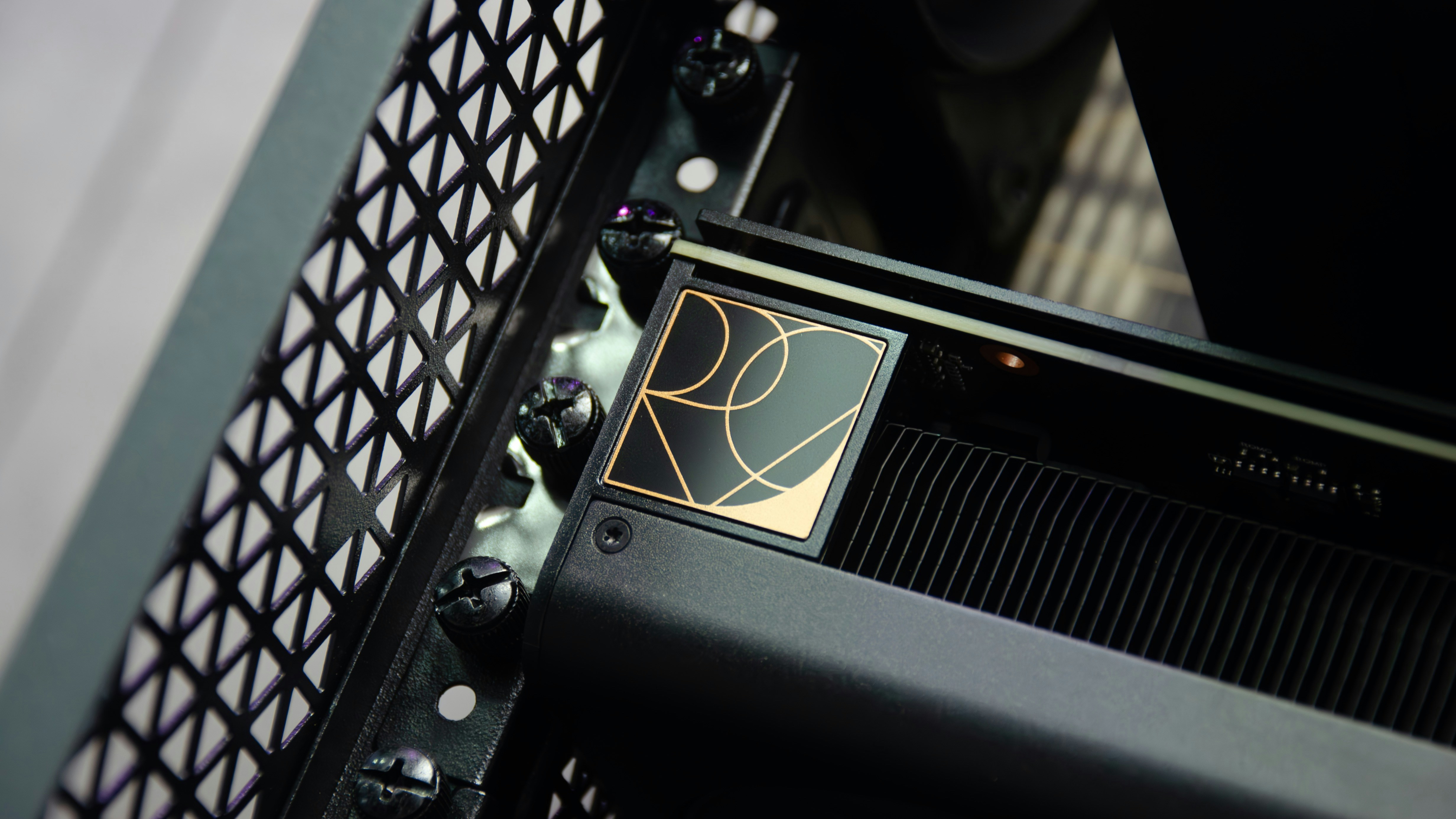 A close up of a black and gold electronic device