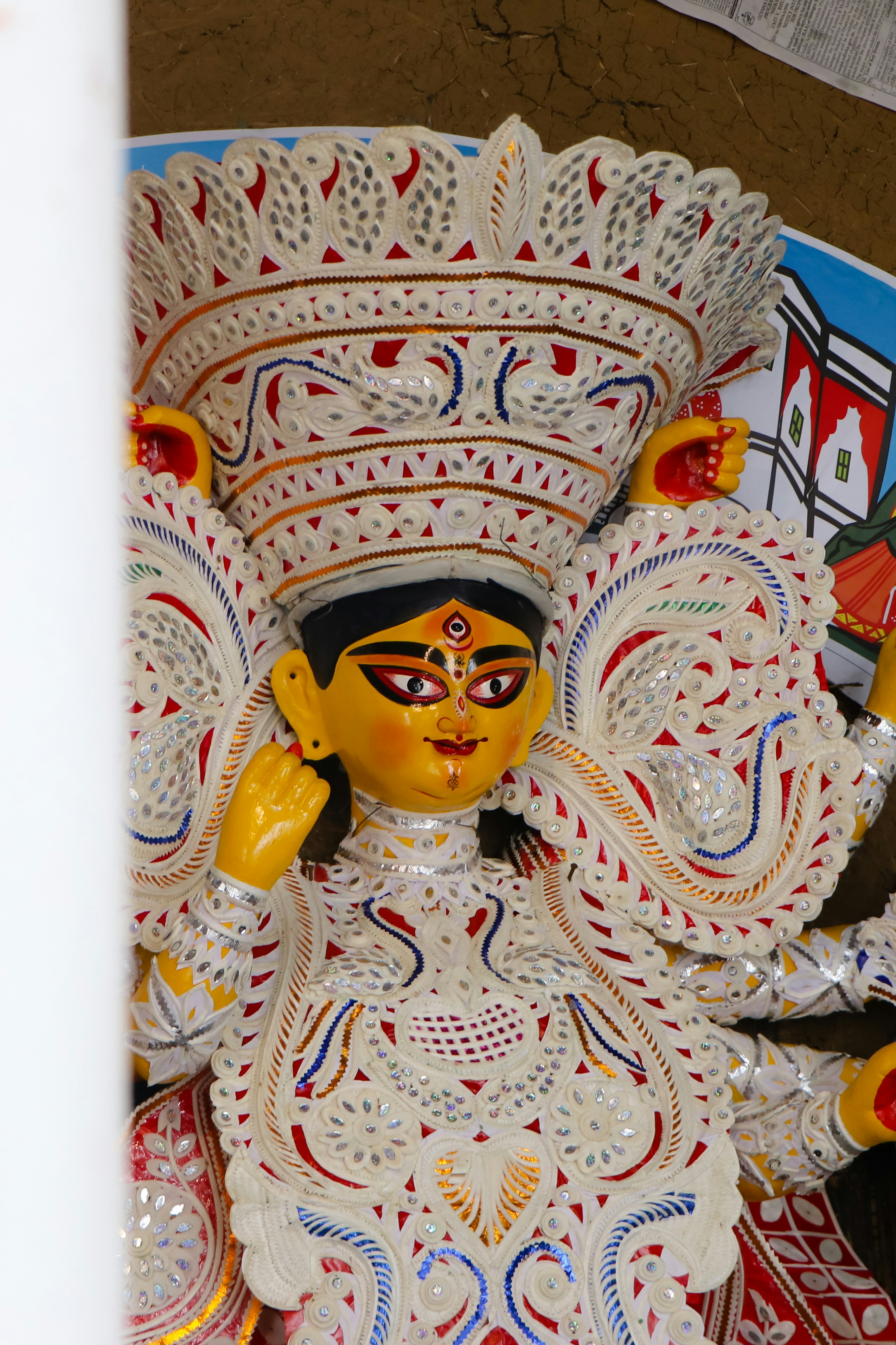 A statue of a woman with a yellow face