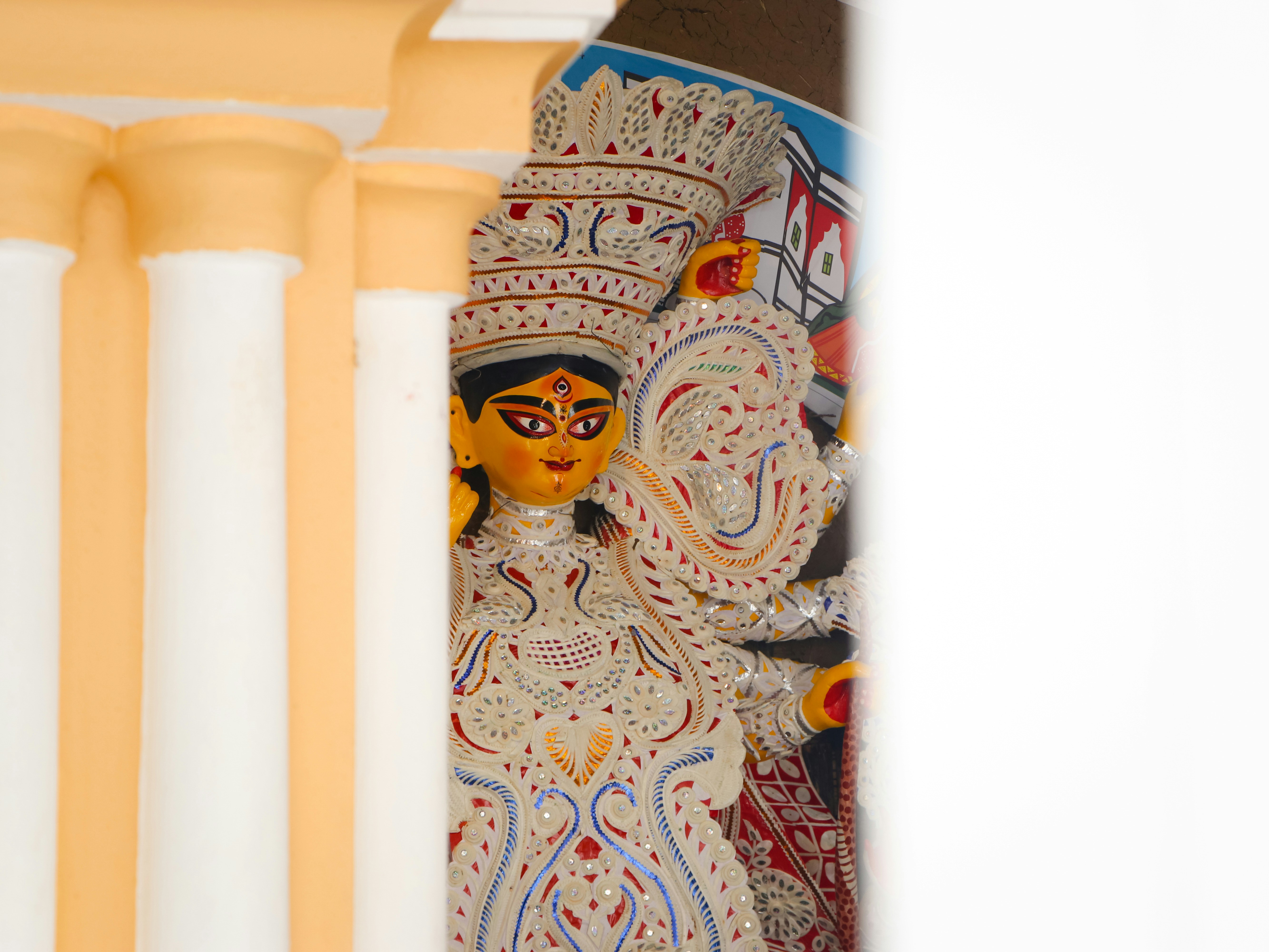 A close up of a statue on a wall