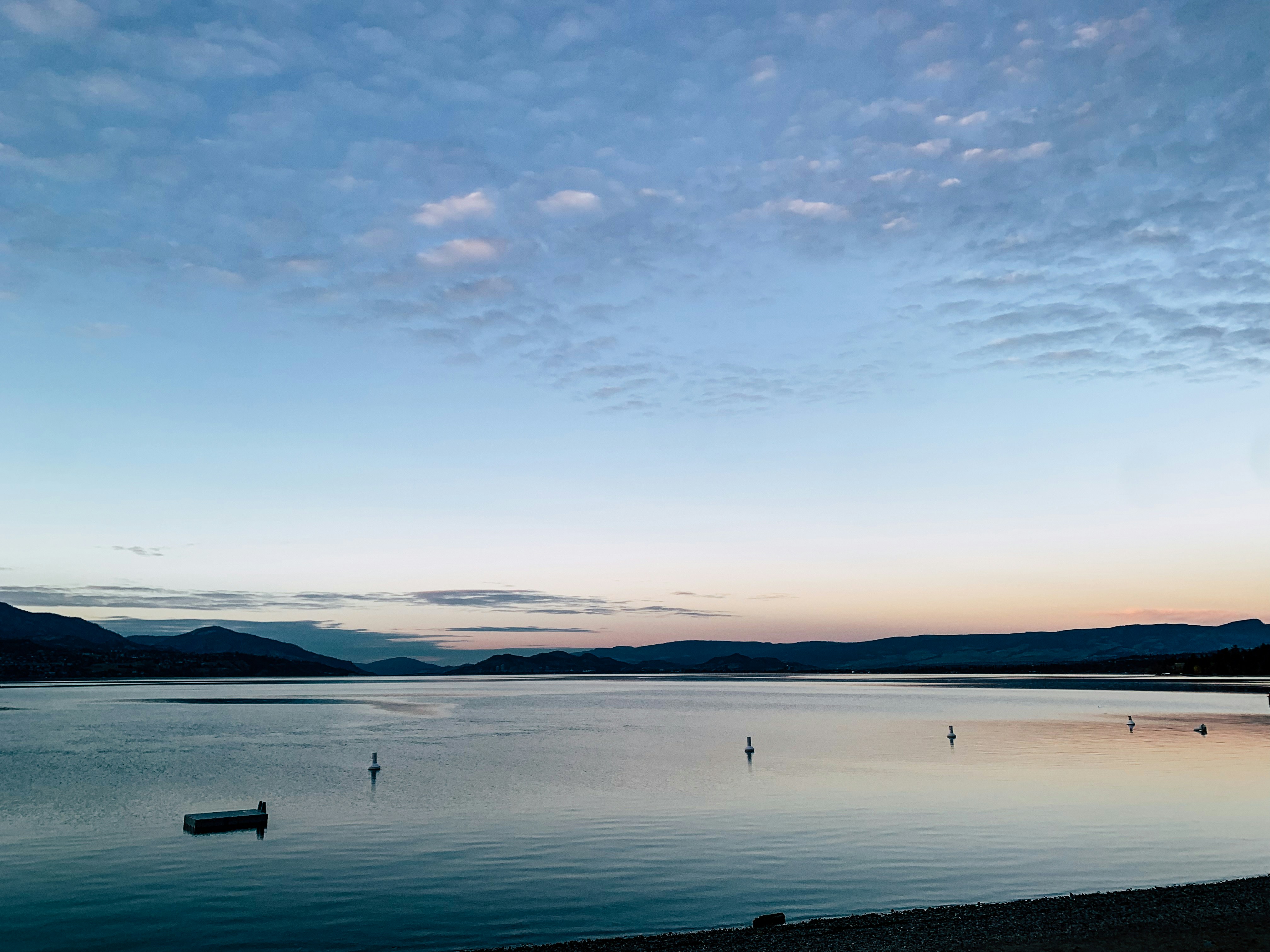 A body of water with a boat in the distance