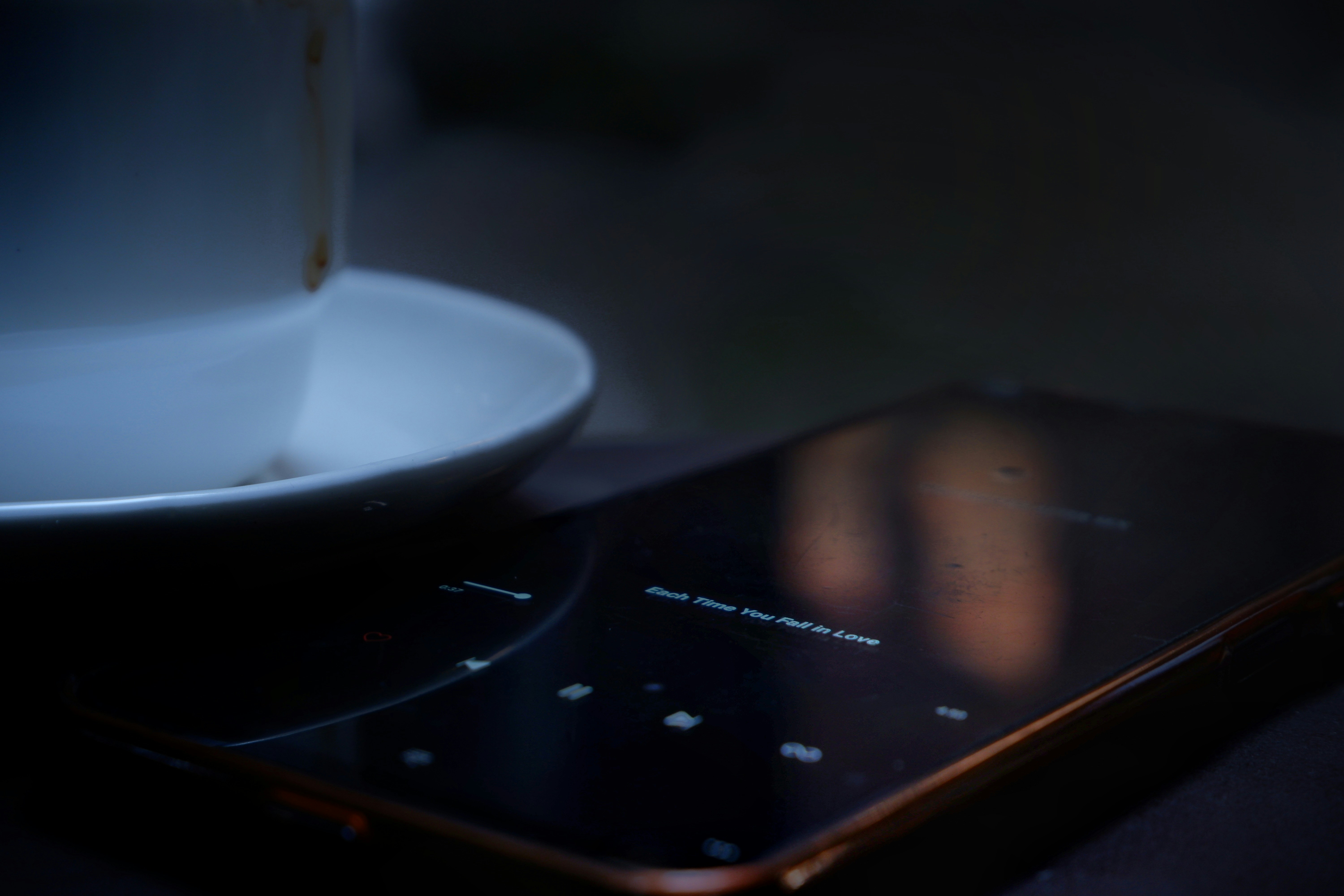 A close up of a cell phone on a table