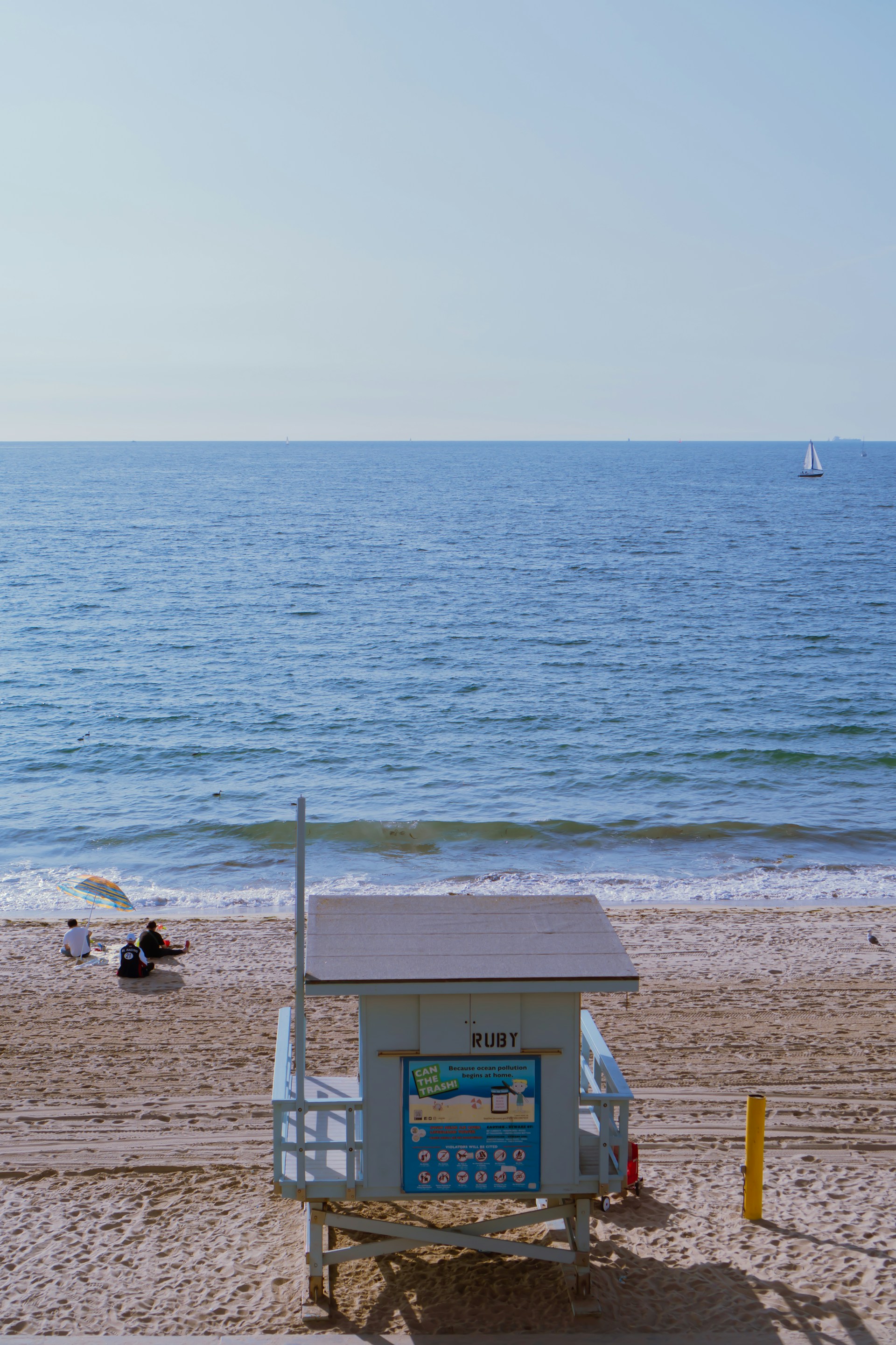 A lifeguard station on a beach near the ocean