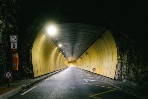 A tunnel with a light at the end of it