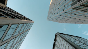 Looking up at tall buildings in a city